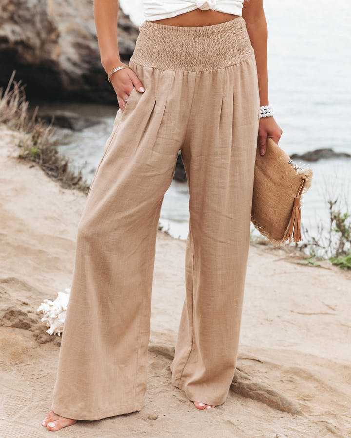 Pantaloni donna a vita alta fluidi con gambe larghe