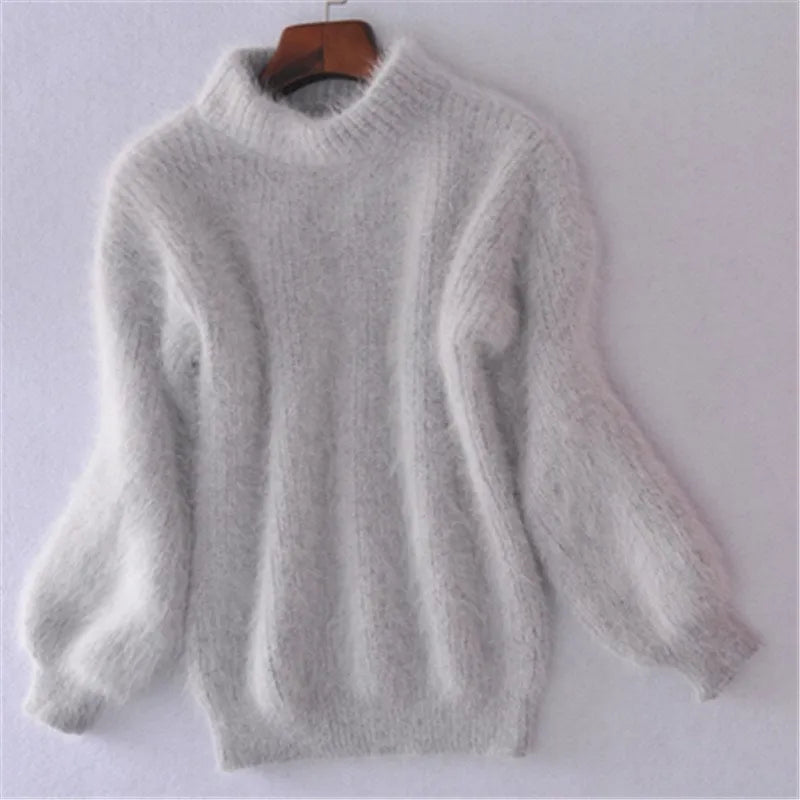 Pull femme à col montant en maille moelleuse
