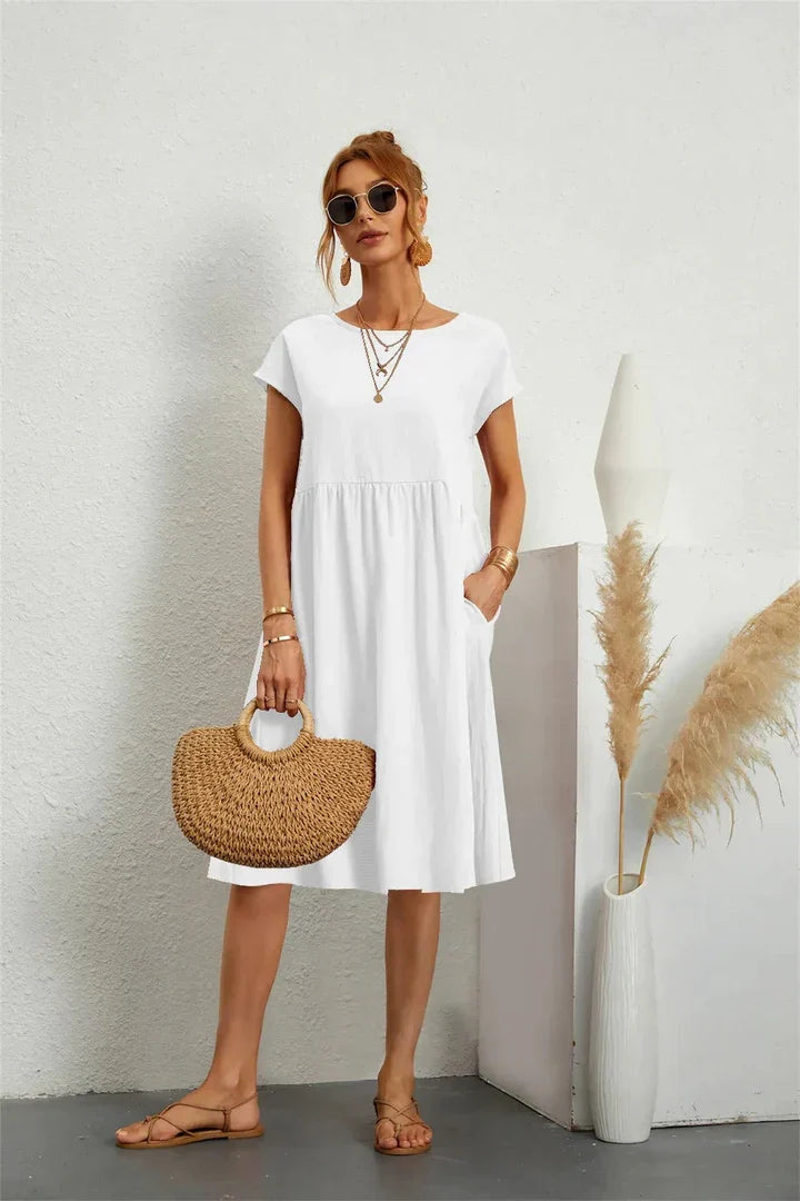 Γυναικείο μίντι φόρεμα με κοντά μανίκια και τσέπες
