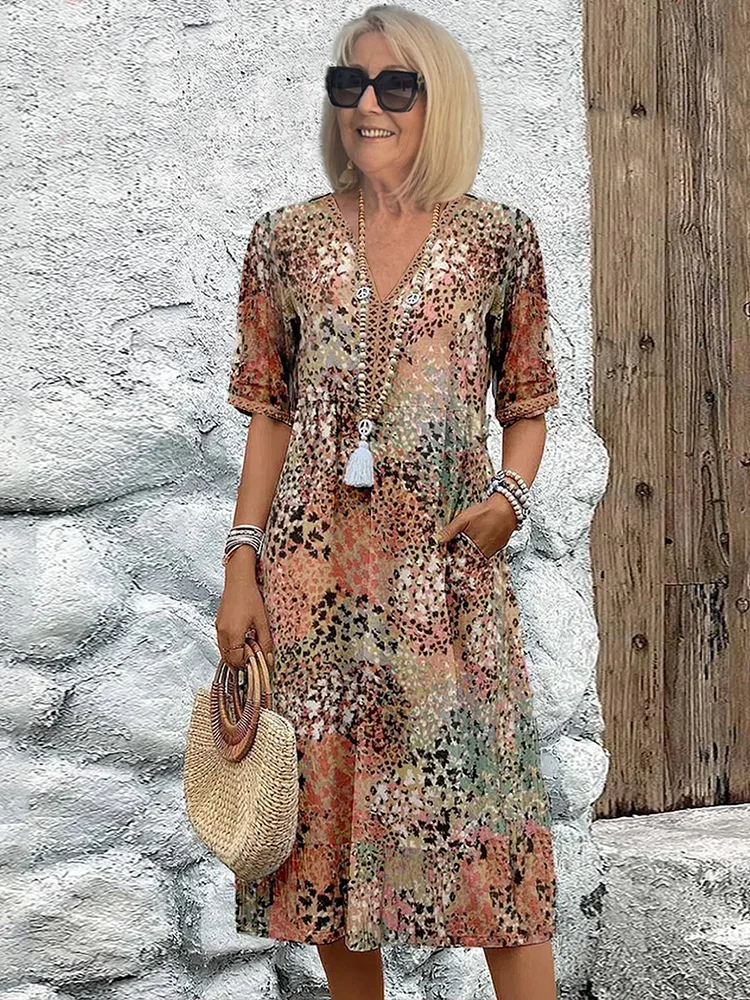Volné neformální midi květinové šaty s elegantním výstřihem do V