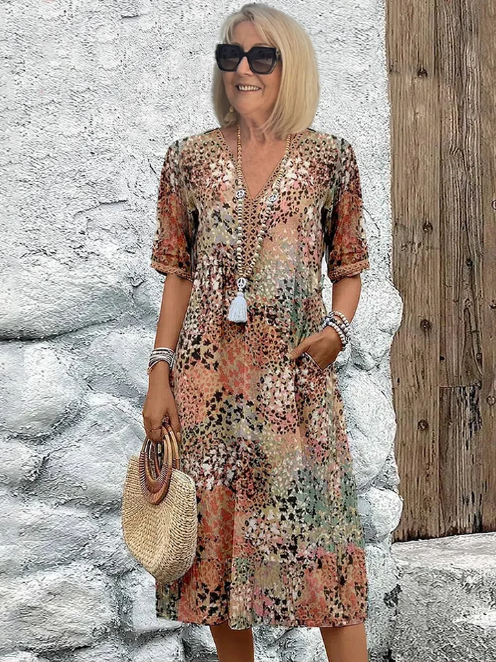 Volné neformální midi květinové šaty s elegantním výstřihem do V