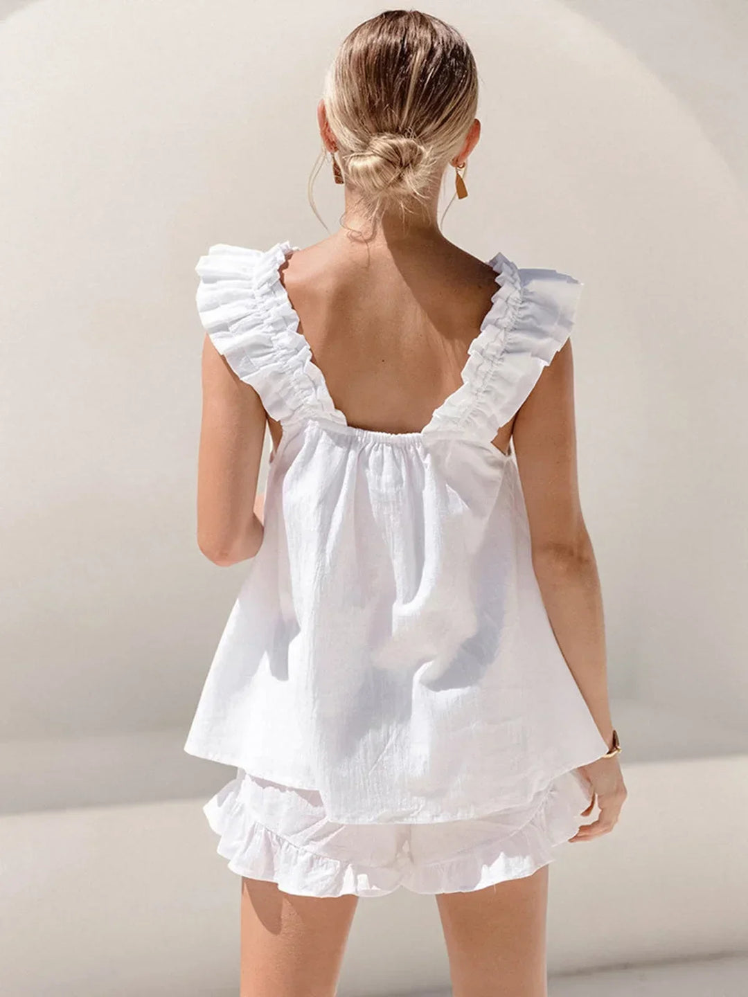 Completo donna top con volant e short estivi