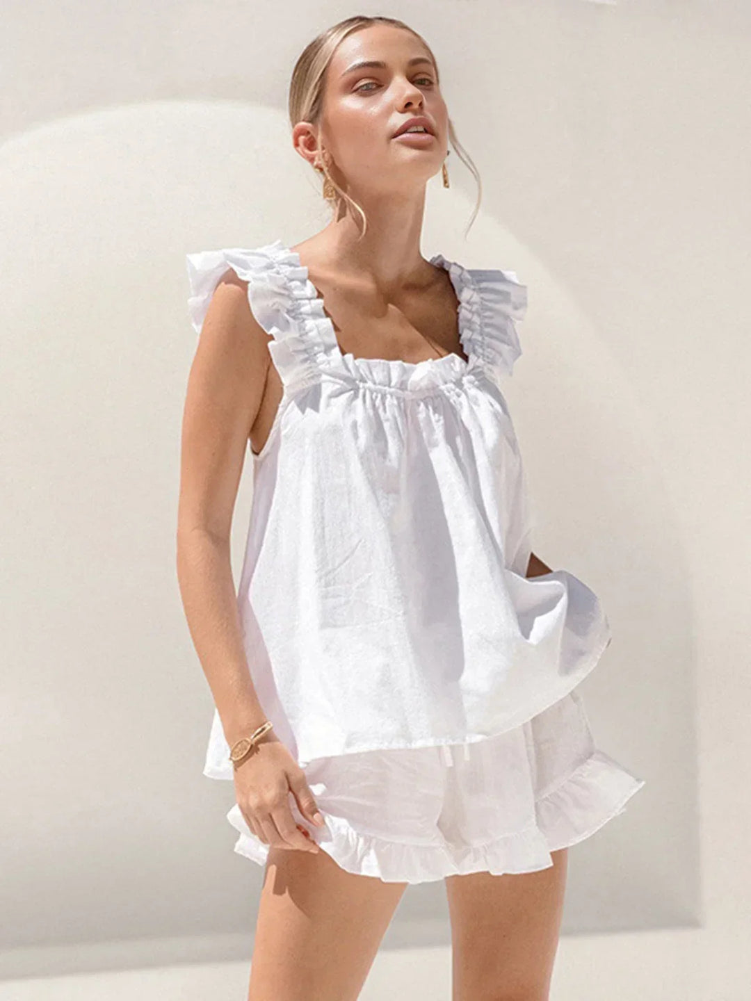 Completo donna top con volant e short estivi