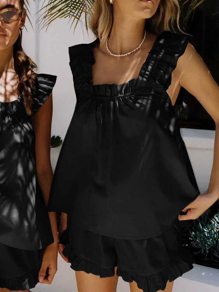 Completo donna top con volant e short estivi
