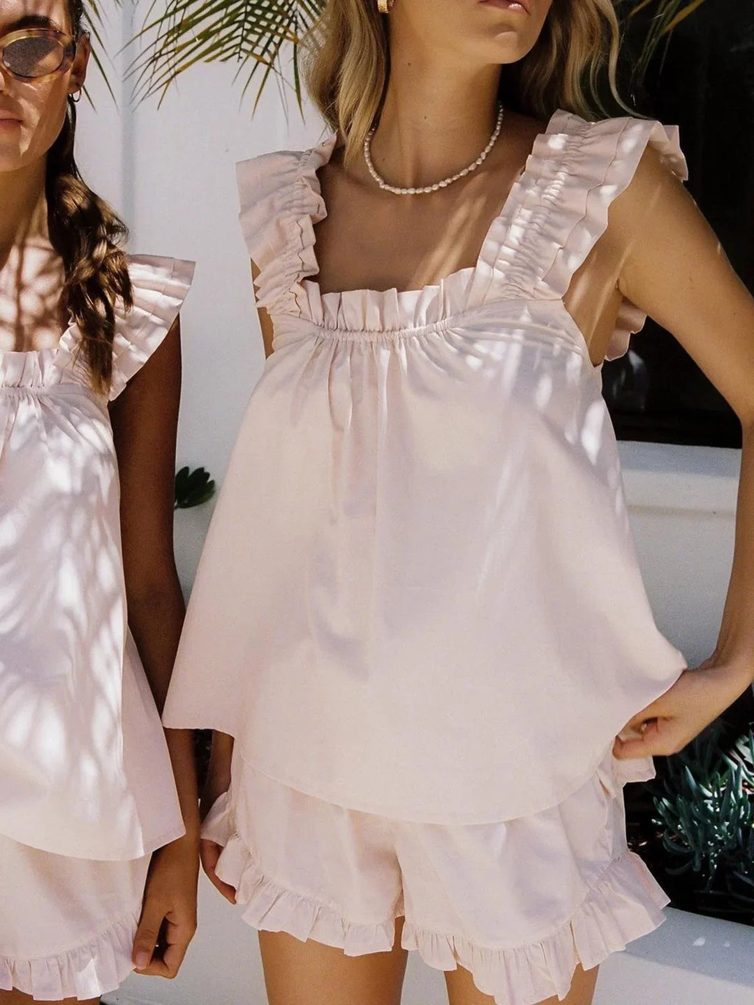 Completo donna top con volant e short estivi