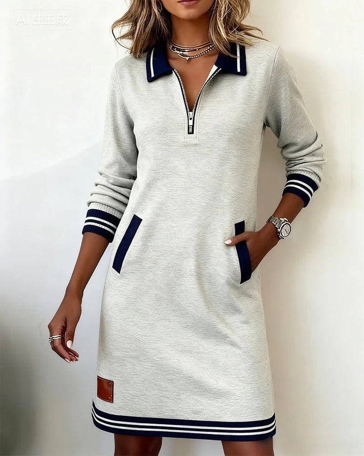 Vestido polo elegante con cuello de cremallera y corte informal