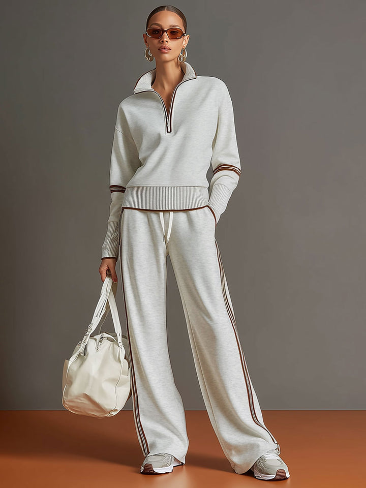Completo sportivo donna con felpa con zip e pantaloni larghi