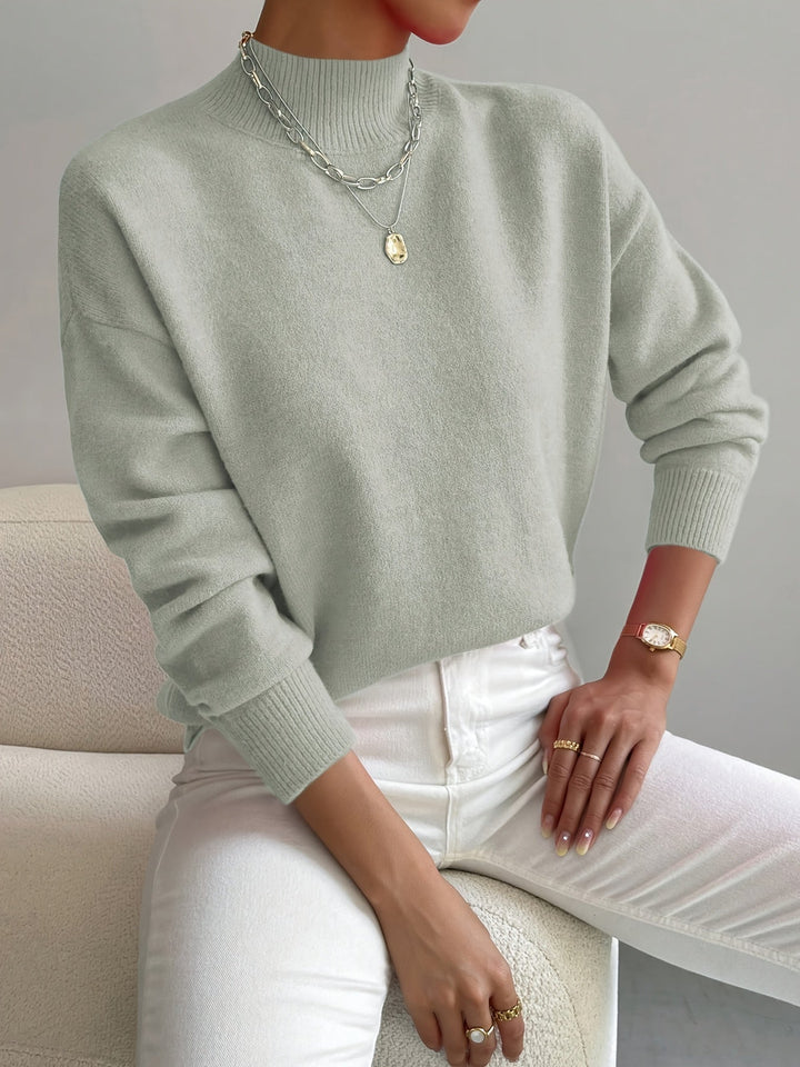 Maglione da donna classico a collo alto e maniche lunghe