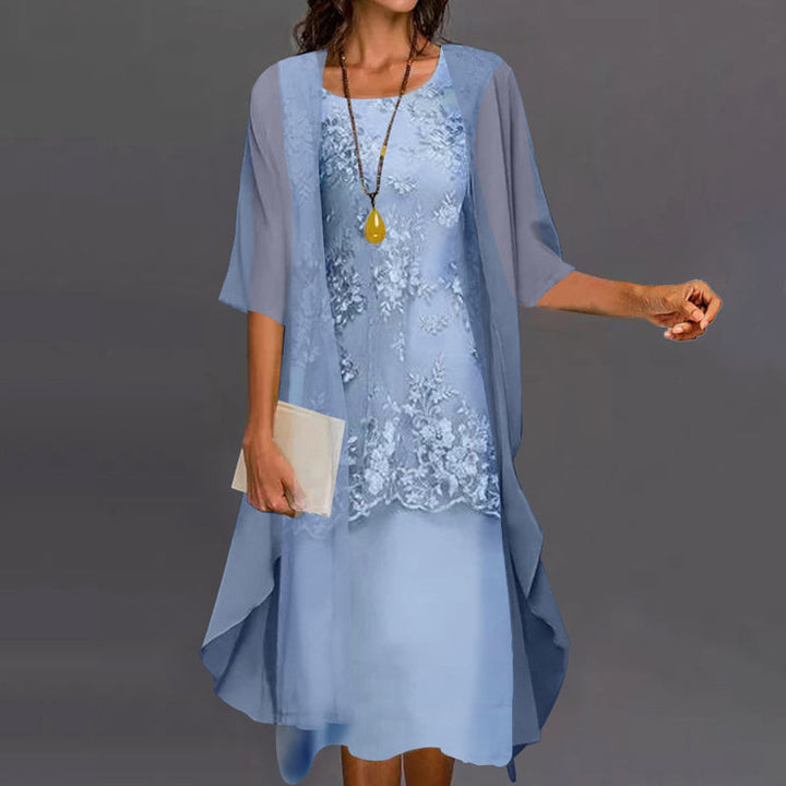 Elegante completo da donna in due pezzi con sovrapposizione di pizzo