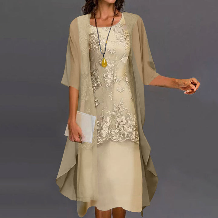 Elegante completo da donna in due pezzi con sovrapposizione di pizzo