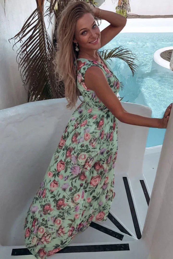 Dlouhé květované dámské maxi šaty s rozparkem a výstřihem do V v boho stylu