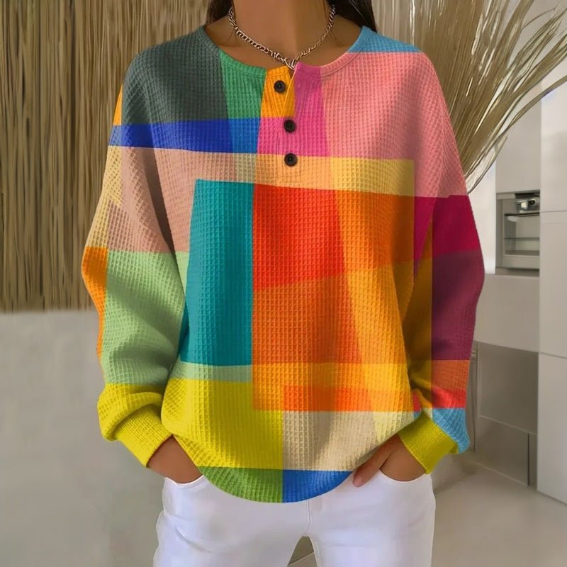 Pull da donna colorato con motivi geometrici