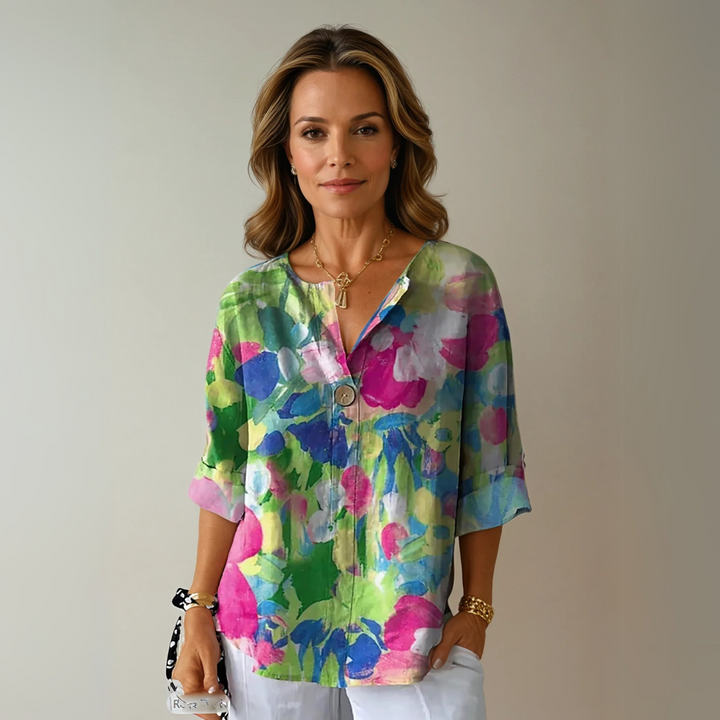 Blusa donna con stampa floreale e maniche corte