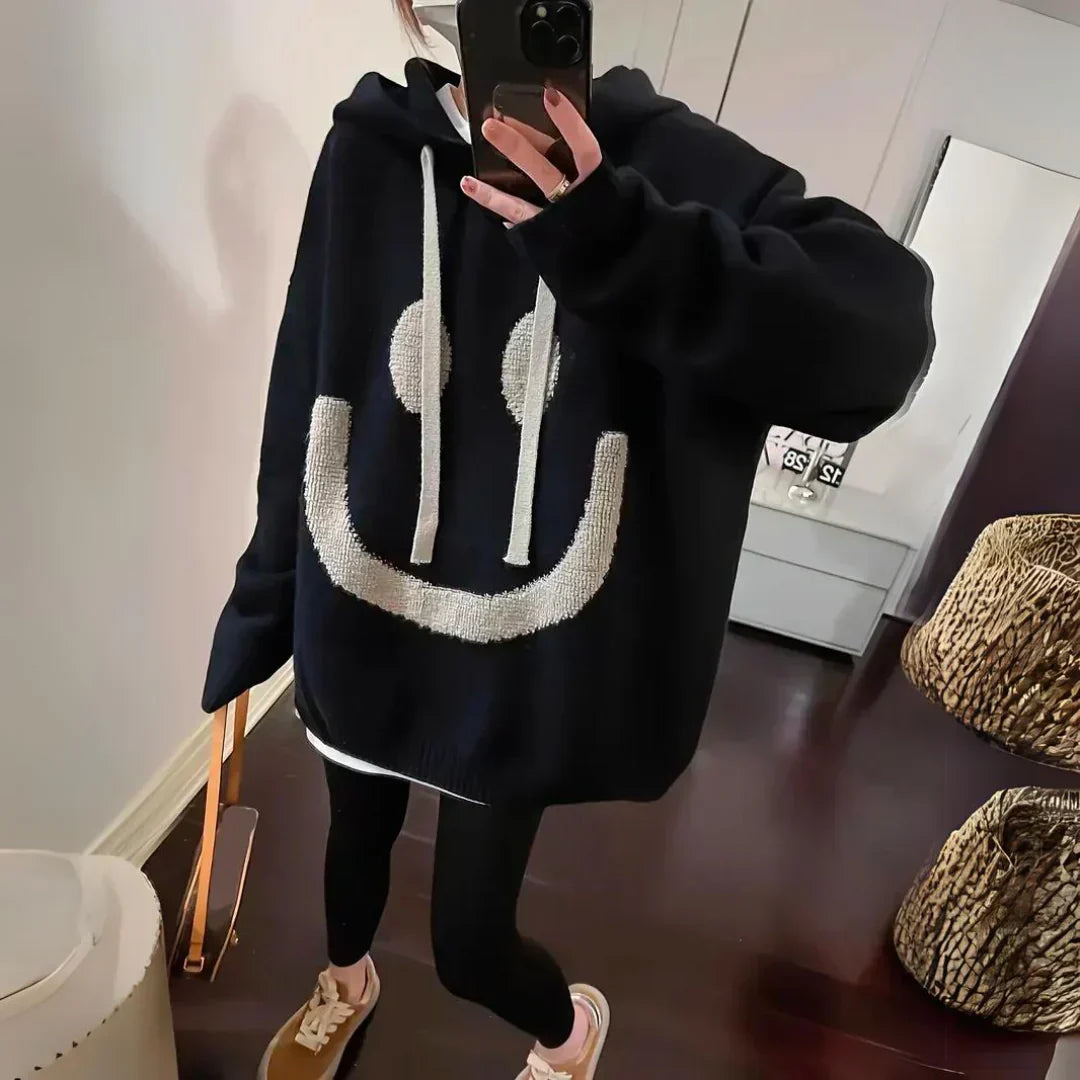 Maglione oversize in maglia con cappuccio e smile da donna