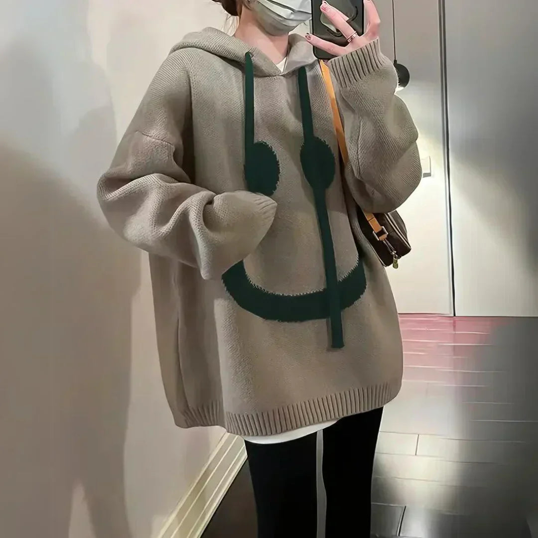 Maglione oversize in maglia con cappuccio e smile da donna